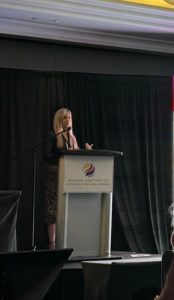 Dr Jennifer Murdock giving a pesentation at Global Aesthetics