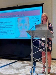 Dr Jennifer Murdock giving a presentation on Fat pad repositioning and volume loss